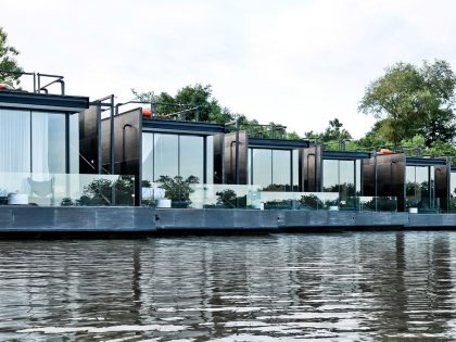 A Beautiful Floating Home with Lush Landscape and Mountain Views on the River Kwai