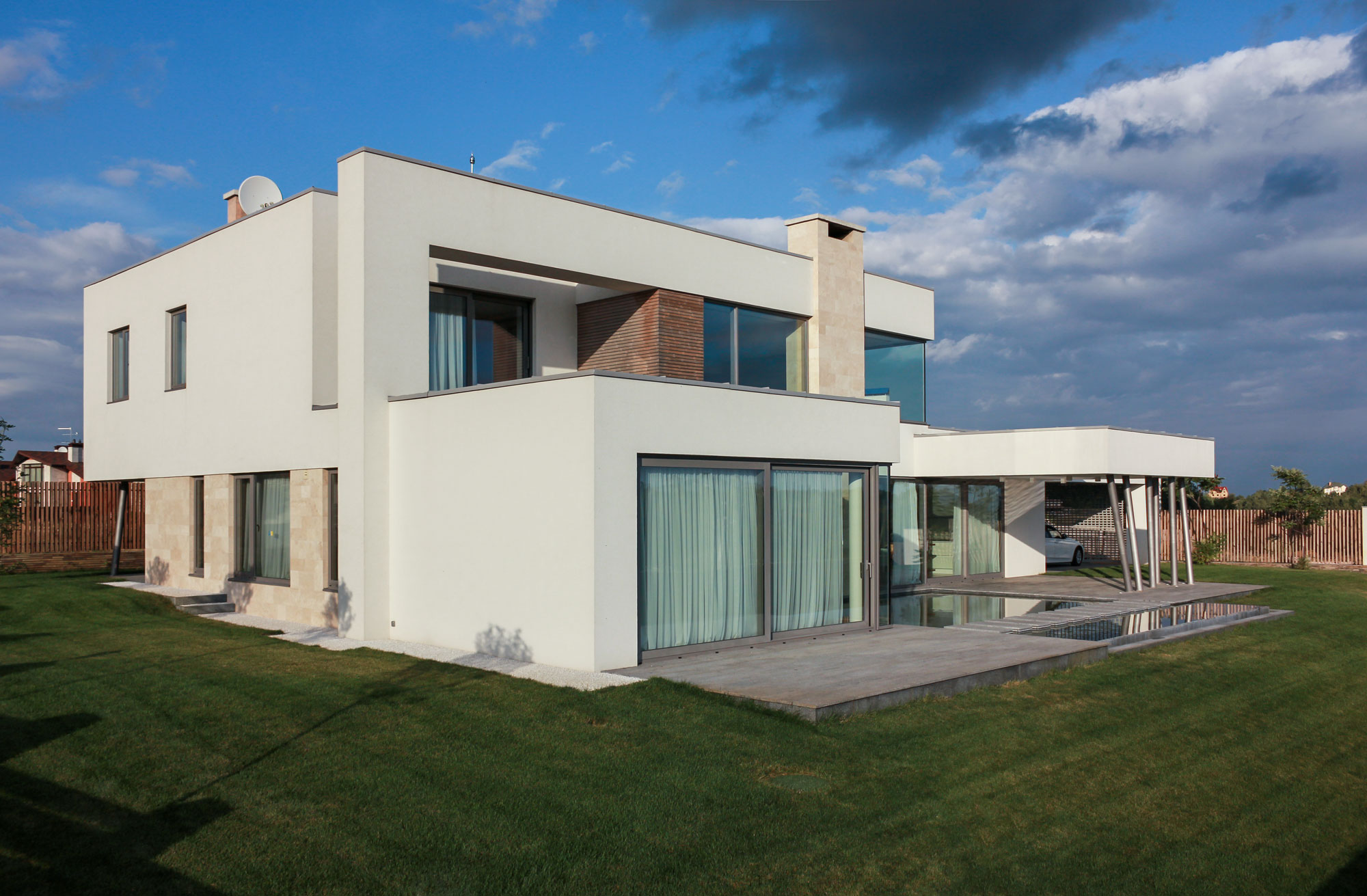 A House with Strict Geometry on Facades with Arrhythmic Columns in the Suburbs of Kiev by Kupinskiy & Partners (1)