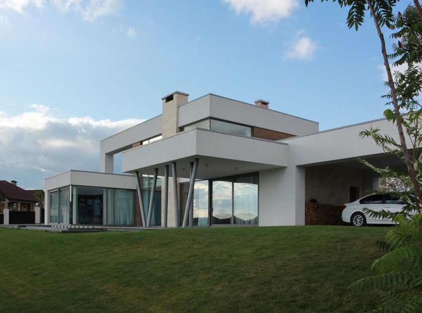 A House with Strict Geometry on Facades with Arrhythmic Columns in the Suburbs of Kiev by Kupinskiy & Partners (12)