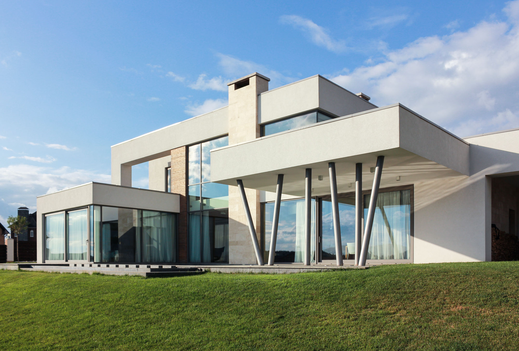 A House with Strict Geometry on Facades with Arrhythmic Columns in the Suburbs of Kiev by Kupinskiy & Partners (14)