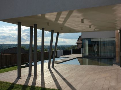 A House with Strict Geometry on Facades with Arrhythmic Columns in the Suburbs of Kiev by Kupinskiy & Partners (16)