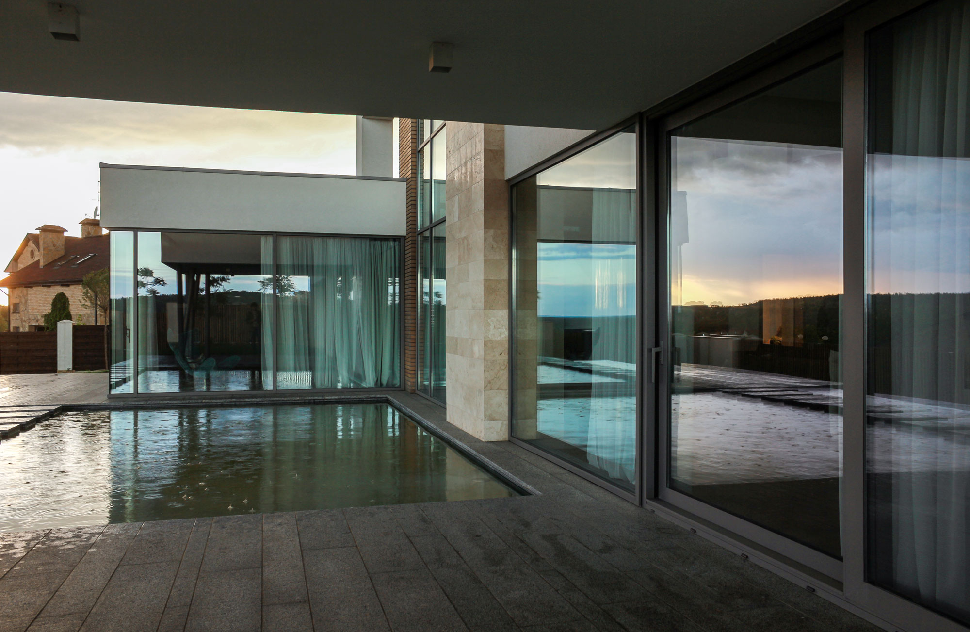 A House with Strict Geometry on Facades with Arrhythmic Columns in the Suburbs of Kiev by Kupinskiy & Partners (17)