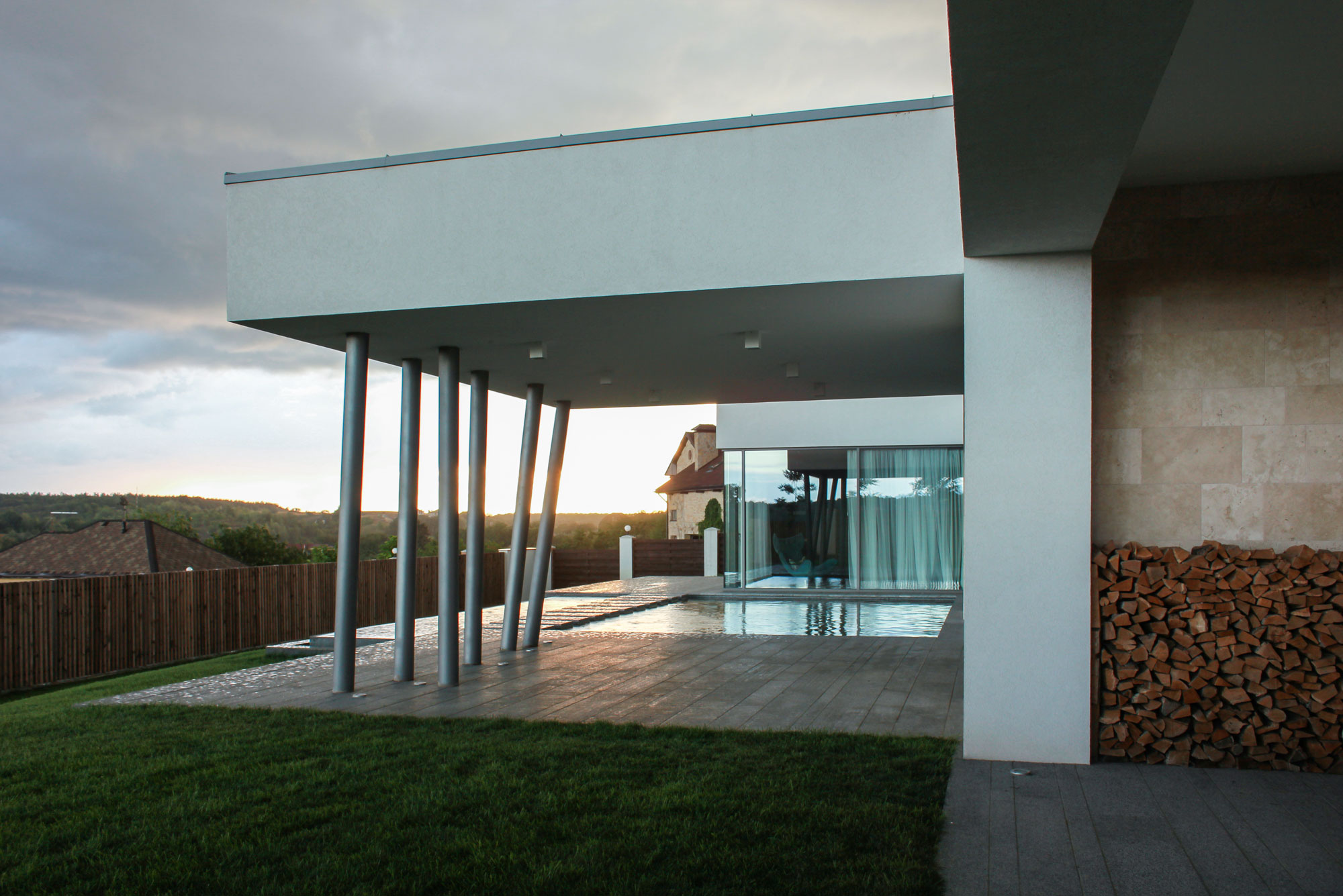 A House with Strict Geometry on Facades with Arrhythmic Columns in the Suburbs of Kiev by Kupinskiy & Partners (19)