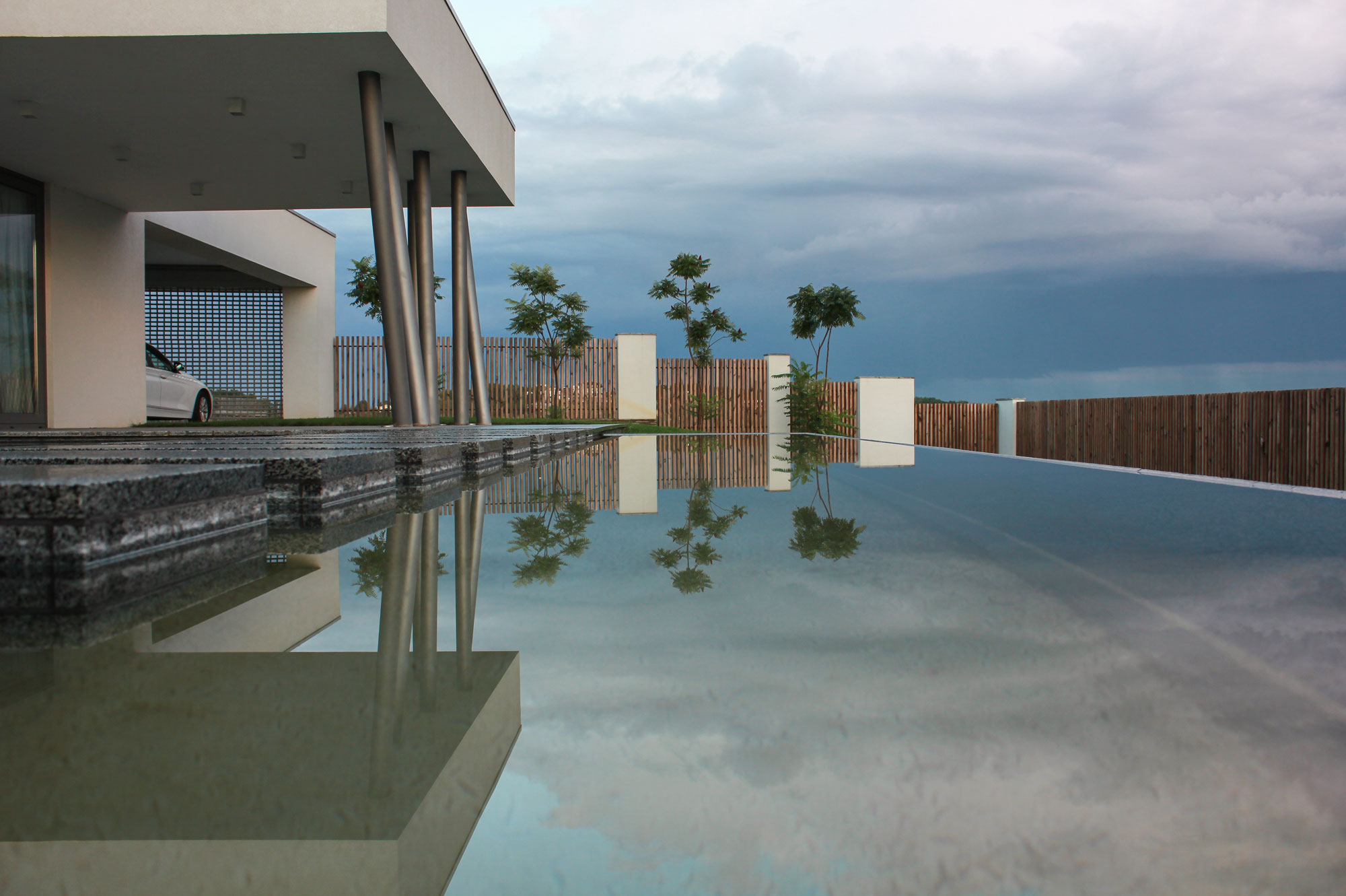 A House with Strict Geometry on Facades with Arrhythmic Columns in the Suburbs of Kiev by Kupinskiy & Partners (8)