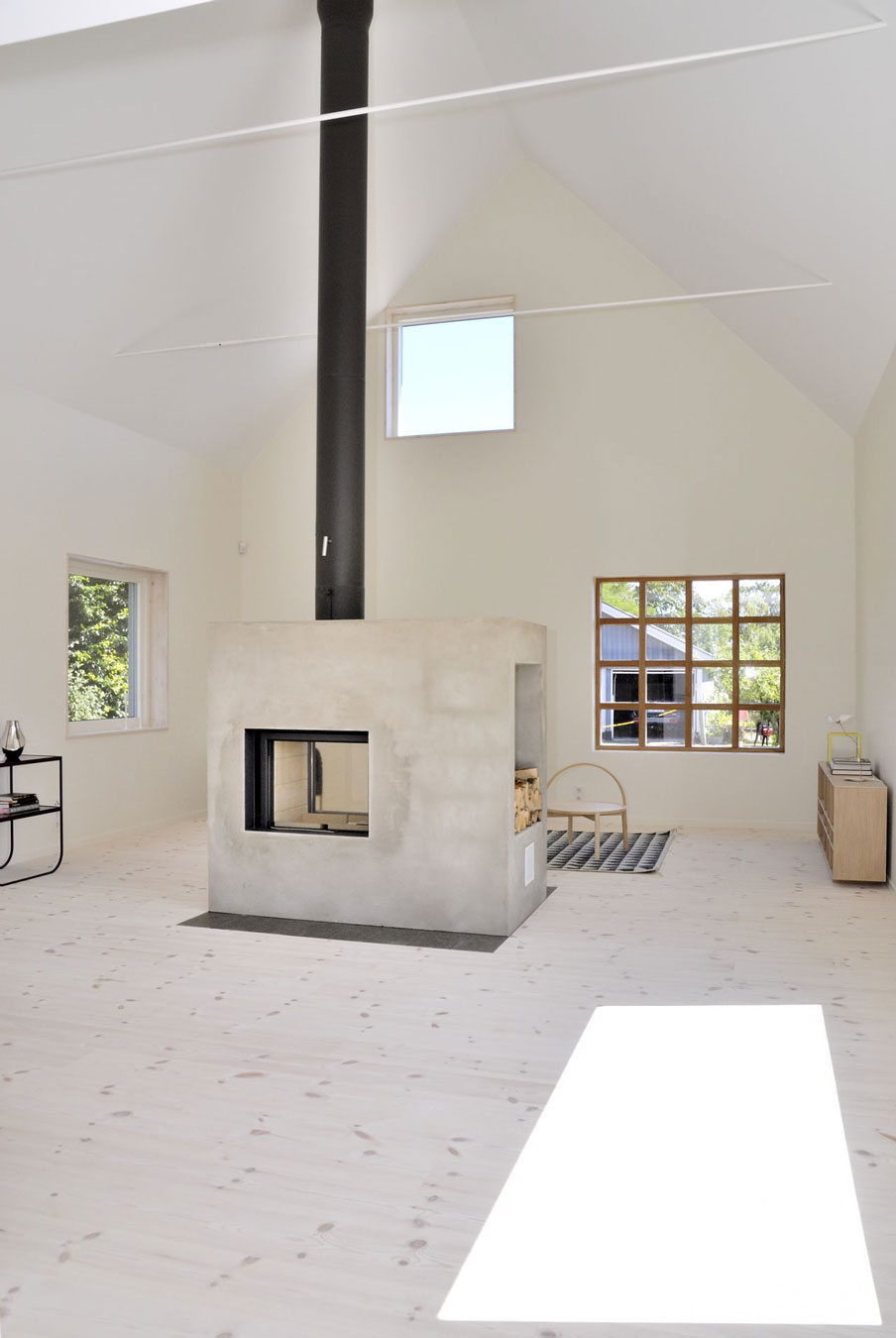 A Lofty Contemporary House with a Concrete Fireplace and High Ceilings in Kivik, Sweden by sandellsandberg arkitekter AB (8)