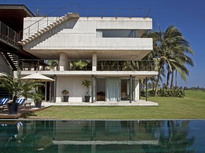 A Modern Concrete Beach House Surrounded by a Lush Green Expanse of Guerrero, Mexico