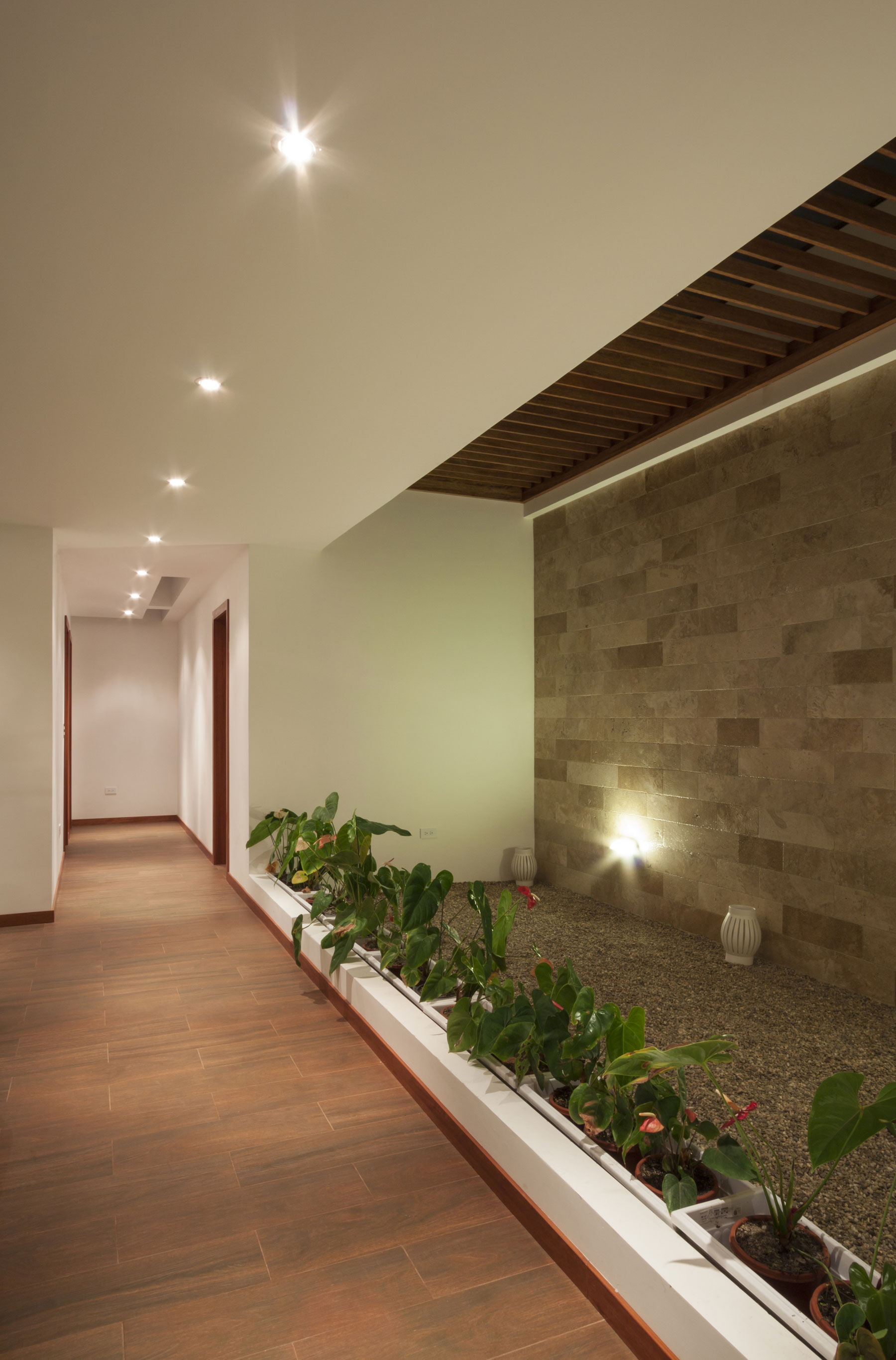A Modern Concrete House Surrounded by a Green Roof and Basement Level in Guayllabamba, Ecuador by AR+C (11)