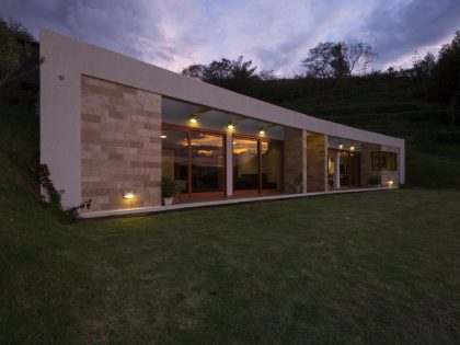 A Modern Concrete House Surrounded by a Green Roof and Basement Level in Guayllabamba, Ecuador by AR+C (12)