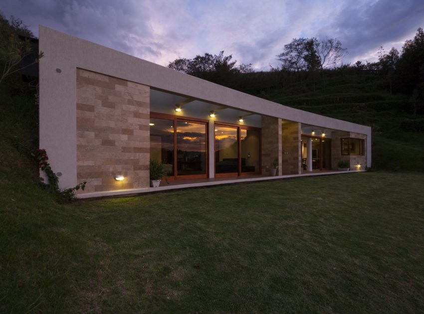 A Modern Concrete House Surrounded by a Green Roof and Basement Level in Guayllabamba, Ecuador by AR+C (12)