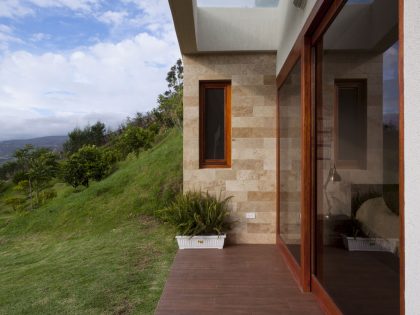 A Modern Concrete House Surrounded by a Green Roof and Basement Level in Guayllabamba, Ecuador by AR+C (6)