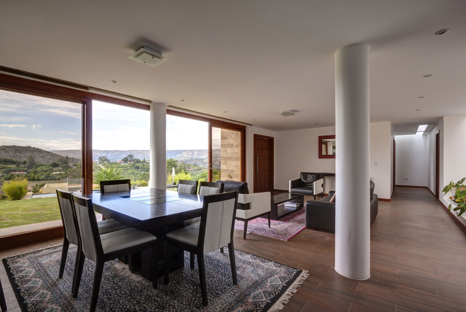 A Modern Concrete House Surrounded by a Green Roof and Basement Level in Guayllabamba, Ecuador by AR+C (7)