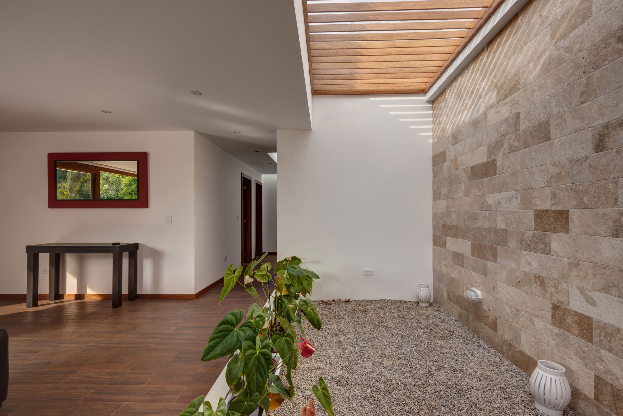 A Modern Concrete House Surrounded by a Green Roof and Basement Level in Guayllabamba, Ecuador by AR+C (8)