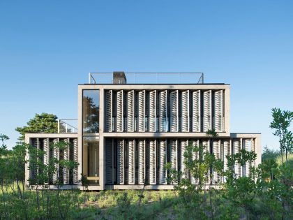 A Modern Home Surrounded by Rolling Dunes with Strips of Canvas in Amagansett by Bates Masi Architects (1)