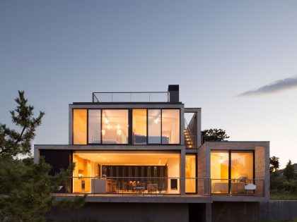 A Modern Home Surrounded by Rolling Dunes with Strips of Canvas in Amagansett by Bates Masi Architects (14)