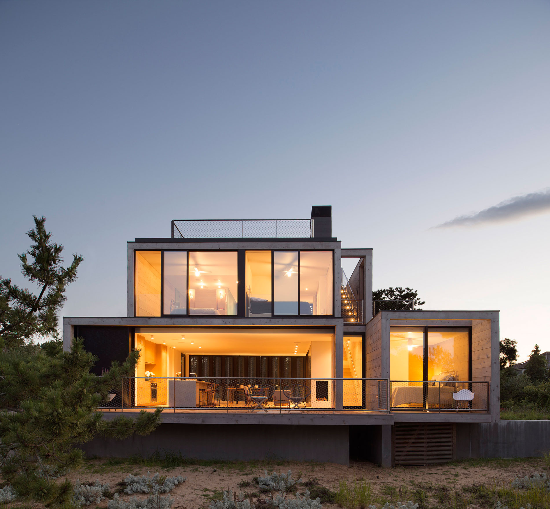 A Modern Home Surrounded by Rolling Dunes with Strips of Canvas in Amagansett by Bates Masi Architects (14)