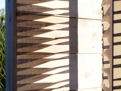 A Modern Home Surrounded by Rolling Dunes with Strips of Canvas in Amagansett by Bates Masi Architects (4)