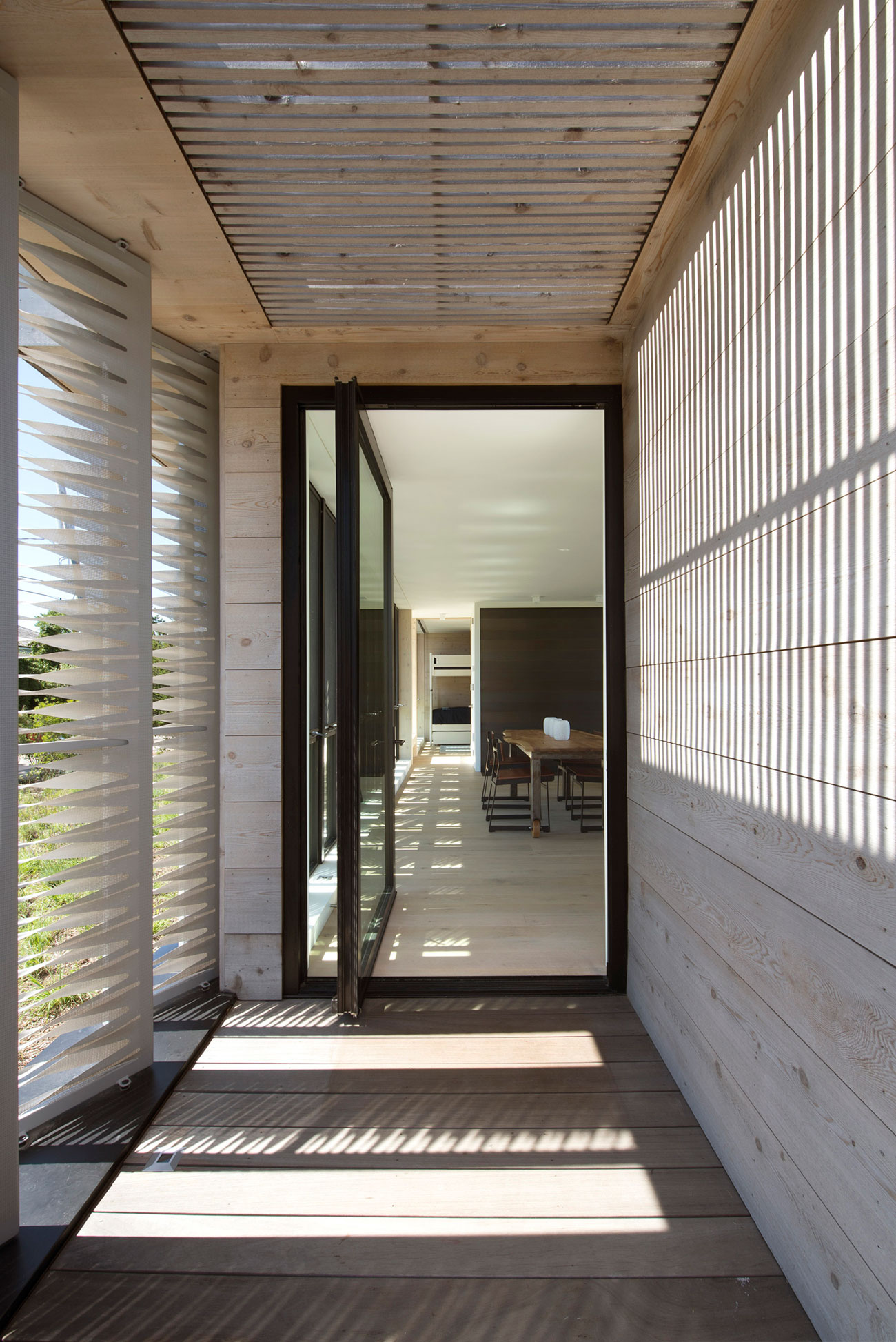 A Modern Home Surrounded by Rolling Dunes with Strips of Canvas in Amagansett by Bates Masi Architects (5)