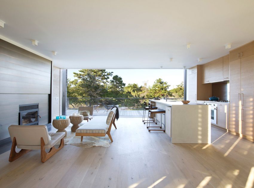 A Modern Home Surrounded by Rolling Dunes with Strips of Canvas in Amagansett by Bates Masi Architects (7)