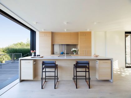 A Modern Home Surrounded by Rolling Dunes with Strips of Canvas in Amagansett by Bates Masi Architects (8)