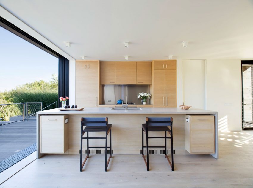 A Modern Home Surrounded by Rolling Dunes with Strips of Canvas in Amagansett by Bates Masi Architects (8)