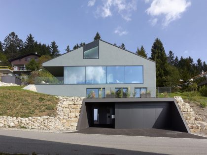 A Modern Minimalist House Built Into the Hillside in Nods, Switzerland by Andrea Pelati Architecte (1)