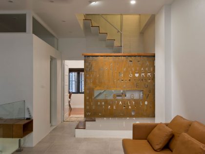 A Lively and Modern Functional House with Small Space Garden in Hanoi