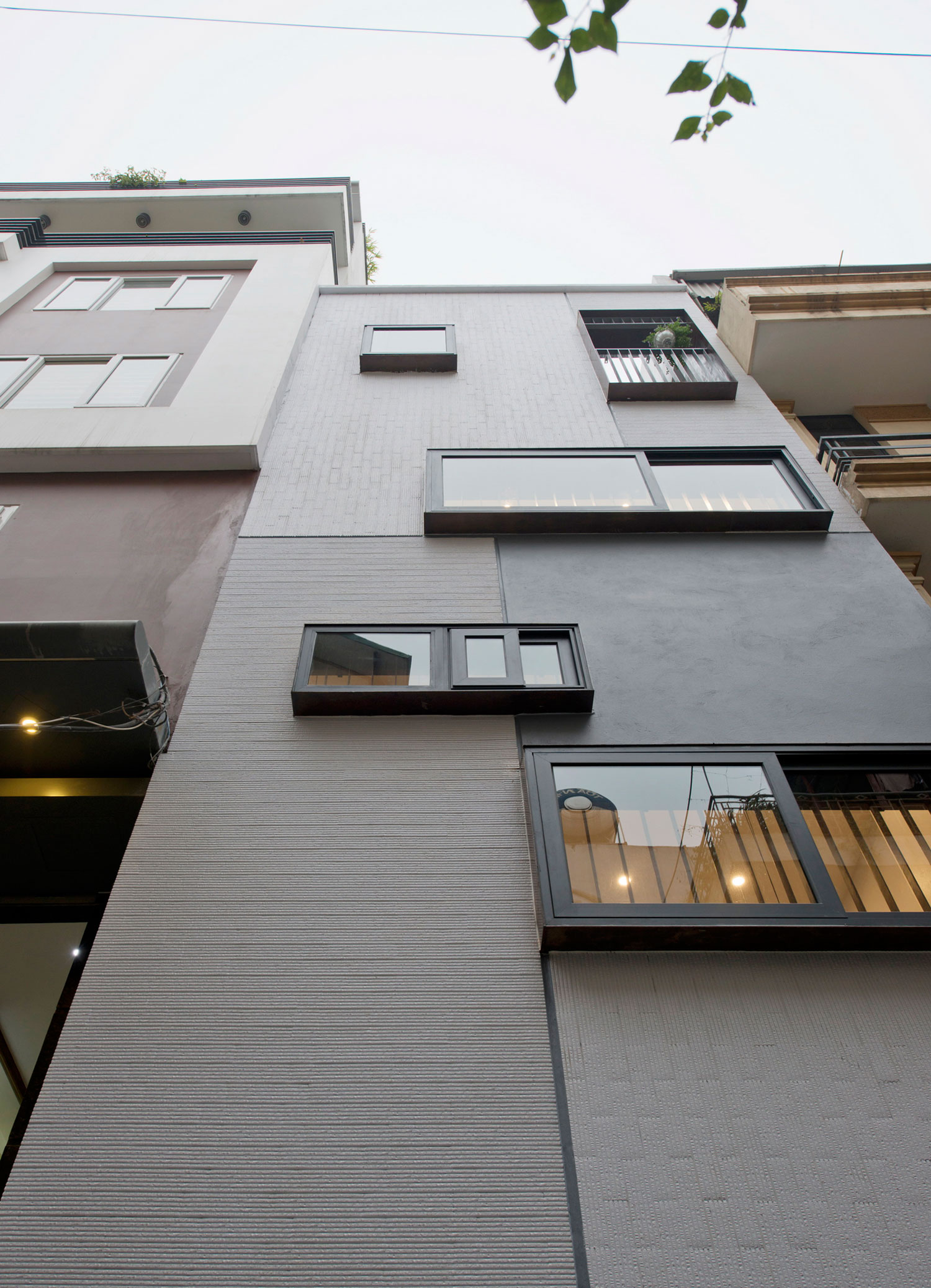 A Lively and Modern Functional House with Small Space Garden in Hanoi by LANDMAK ARCHITECTURE (19)