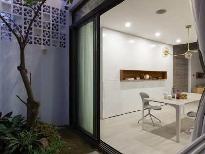 A Row House Transformed into a Bright Home with White Concrete Blocks in Vietnam by LANDMAK ARCHITECTURE (12)