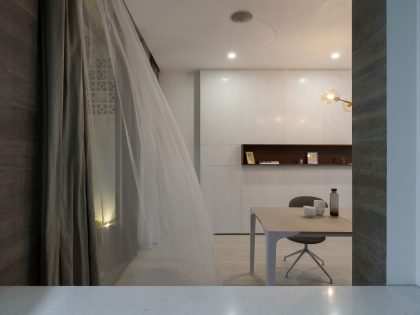 A Row House Transformed into a Bright Home with White Concrete Blocks in Vietnam by LANDMAK ARCHITECTURE (13)