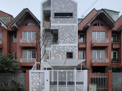 A Row House Transformed into a Bright Home with White Concrete Blocks in Vietnam by LANDMAK ARCHITECTURE (2)