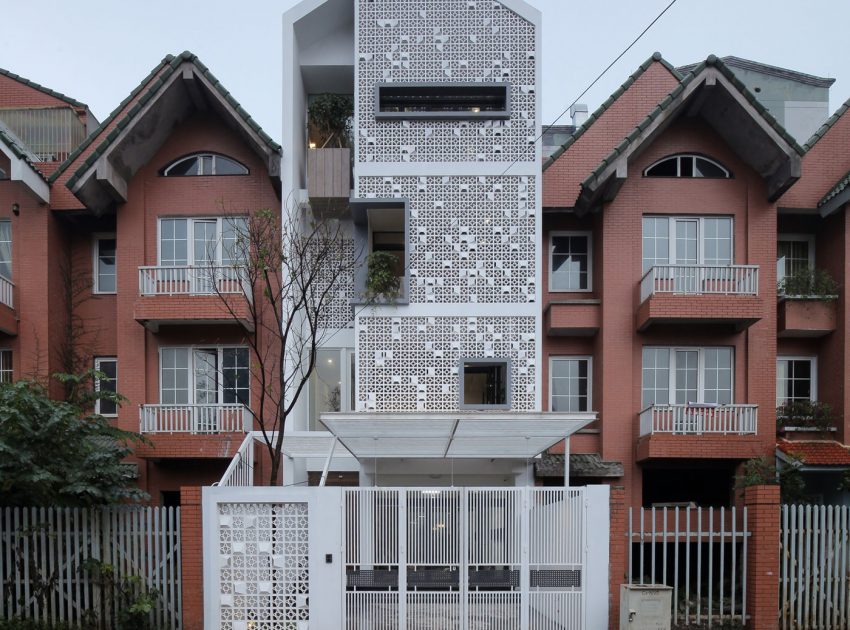 A Row House Transformed into a Bright Home with White Concrete Blocks in Vietnam by LANDMAK ARCHITECTURE (2)