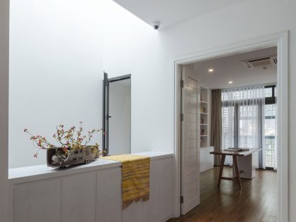 A Row House Transformed into a Bright Home with White Concrete Blocks in Vietnam by LANDMAK ARCHITECTURE (21)