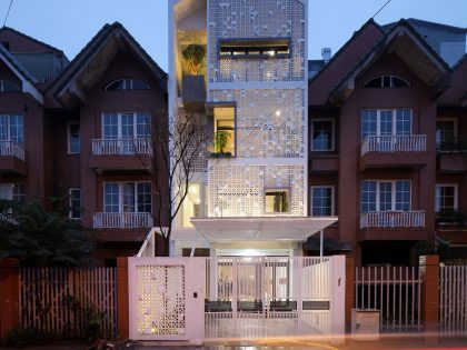 A Row House Transformed into a Bright Home with White Concrete Blocks in Vietnam by LANDMAK ARCHITECTURE (23)