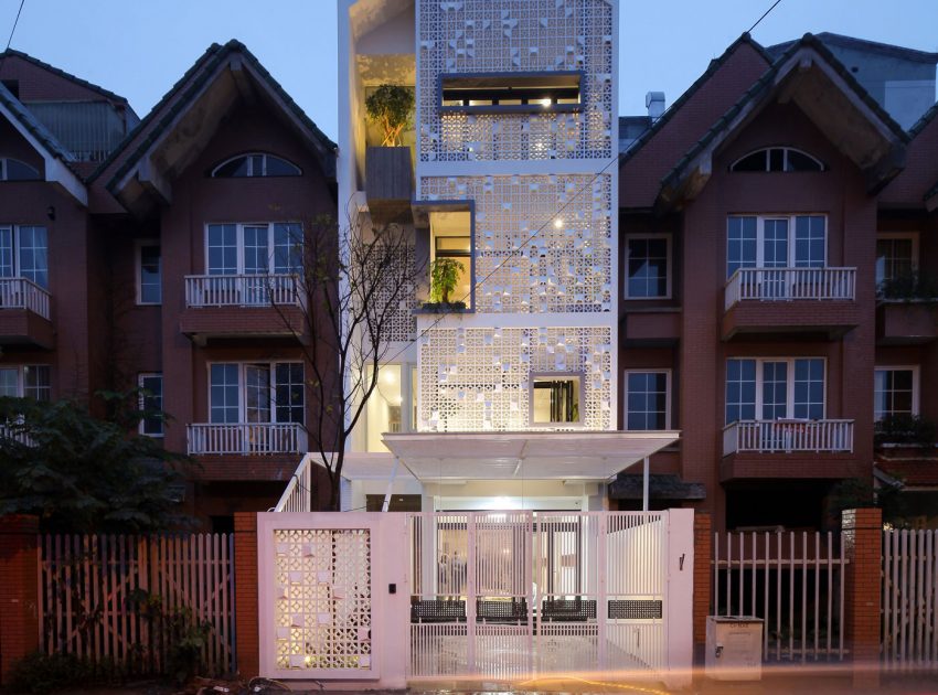 A Row House Transformed into a Bright Home with White Concrete Blocks in Vietnam by LANDMAK ARCHITECTURE (23)