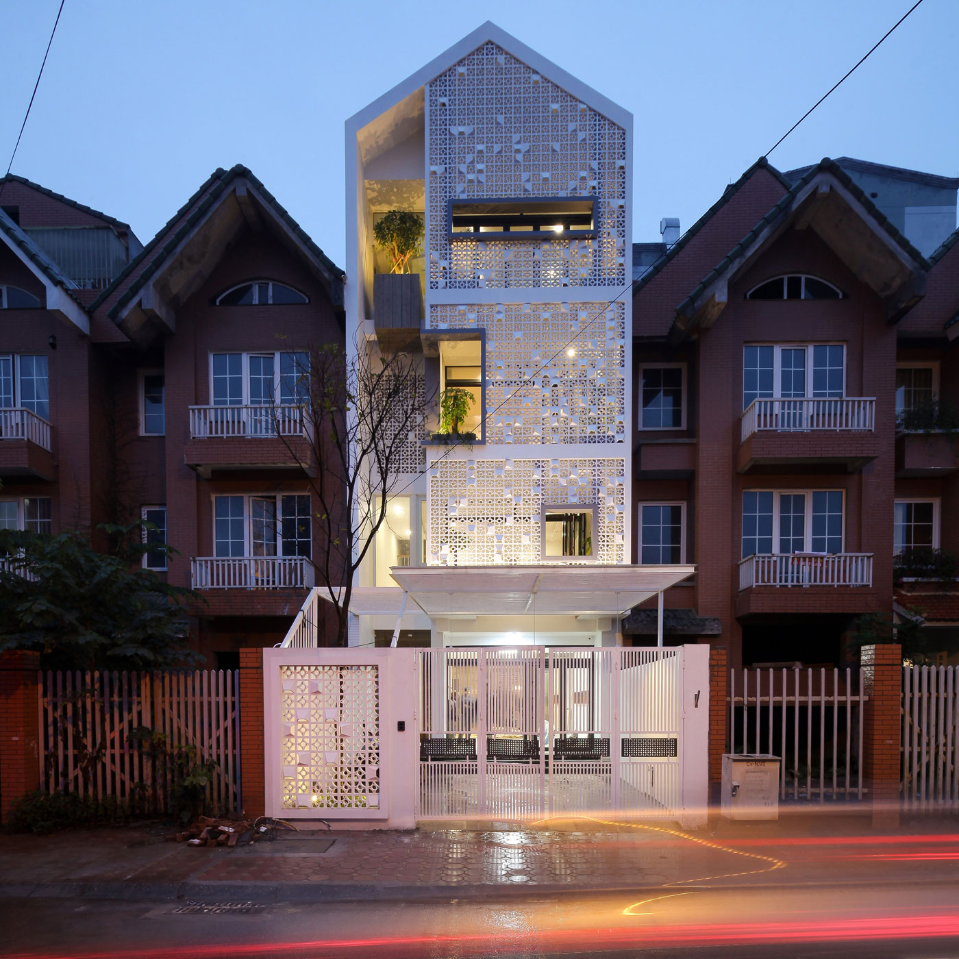 A Row House Transformed into a Bright Home with White Concrete Blocks in Vietnam by LANDMAK ARCHITECTURE (23)