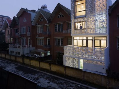 A Row House Transformed into a Bright Home with White Concrete Blocks in Vietnam by LANDMAK ARCHITECTURE (25)