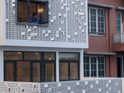 A Row House Transformed into a Bright Home with White Concrete Blocks in Vietnam by LANDMAK ARCHITECTURE (3)