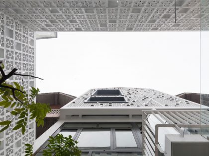 A Row House Transformed into a Bright Home with White Concrete Blocks in Vietnam by LANDMAK ARCHITECTURE (4)