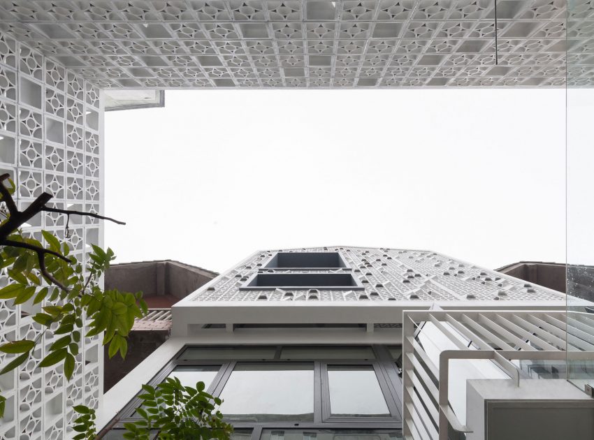 A Row House Transformed into a Bright Home with White Concrete Blocks in Vietnam by LANDMAK ARCHITECTURE (4)