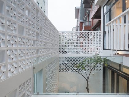 A Row House Transformed into a Bright Home with White Concrete Blocks in Vietnam by LANDMAK ARCHITECTURE (5)