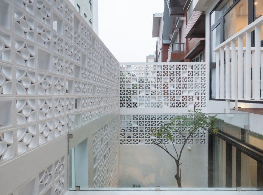 A Row House Transformed into a Bright Home with White Concrete Blocks in Vietnam by LANDMAK ARCHITECTURE (5)