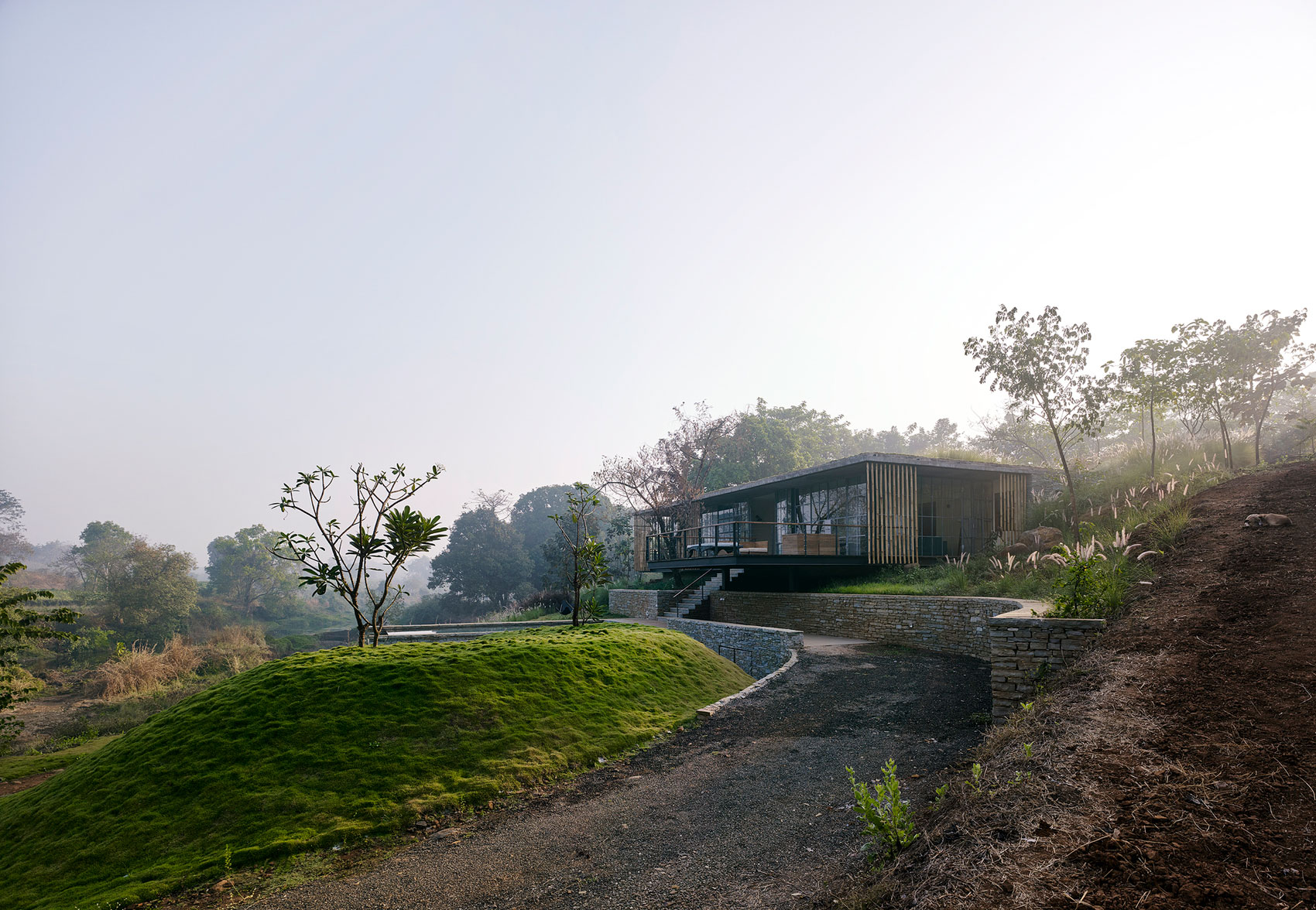 A Rustic Contemporary Home Nestled on Top of a Mountain in Harmony with Nature of Maharashtra by Architecture BRIO (2)