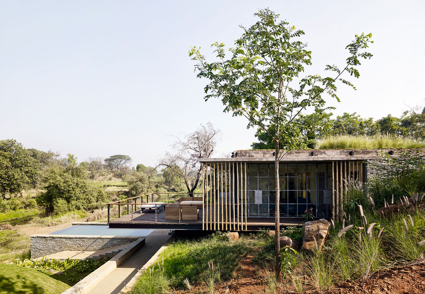 A Rustic Contemporary Home Nestled on Top of a Mountain in Harmony with Nature of Maharashtra by Architecture BRIO (4)