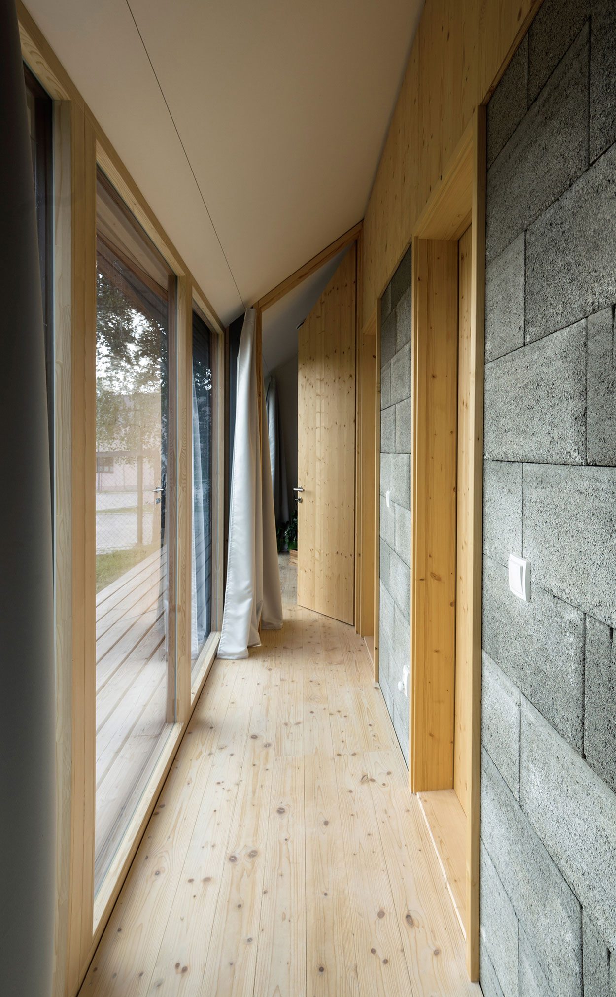 A Rustic Versatile House with Natural Light and Passive Solar Power in Slovakia by Martin Boles Architect (16)