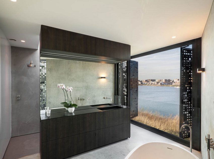 A Sleek and Bright Contemporary Home Surrounded by Water with Spectacular Views in Amsterdam by Studioninedots (11)