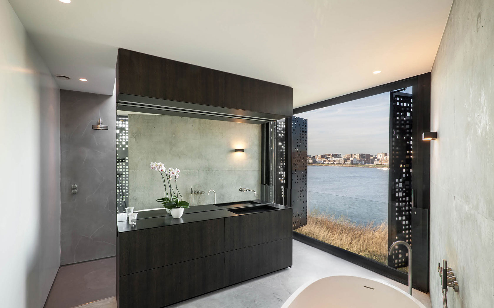 A Sleek and Bright Contemporary Home Surrounded by Water with Spectacular Views in Amsterdam by Studioninedots (11)