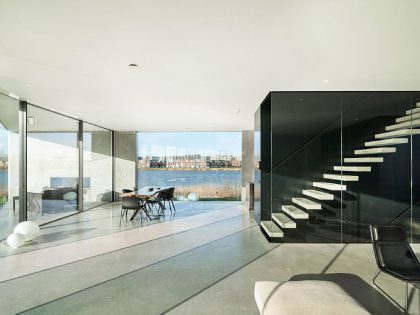 A Sleek and Bright Contemporary Home Surrounded by Water with Spectacular Views in Amsterdam by Studioninedots (4)
