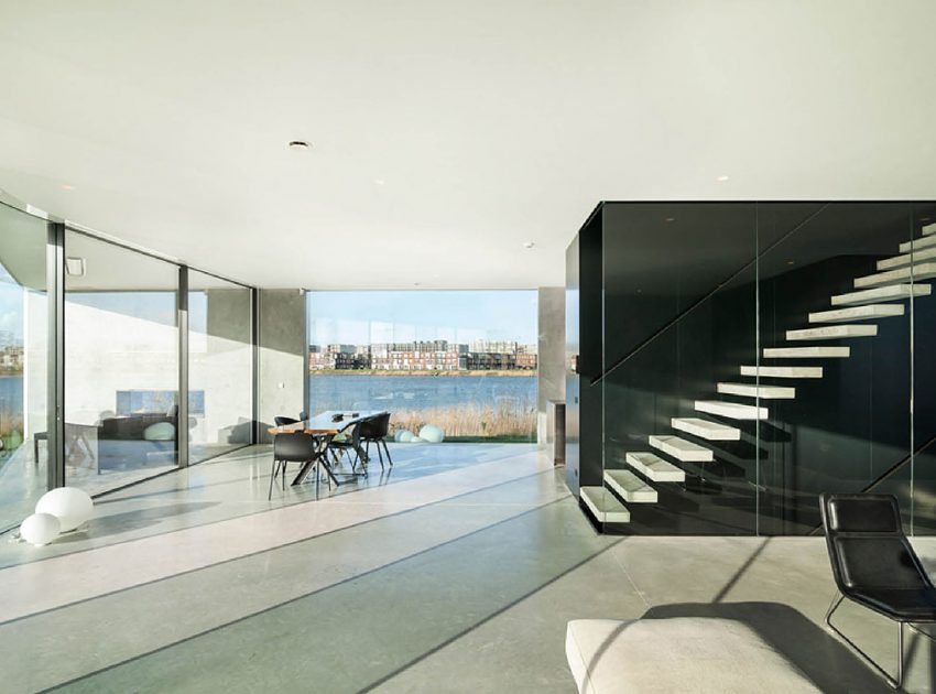 A Sleek and Bright Contemporary Home Surrounded by Water with Spectacular Views in Amsterdam by Studioninedots (4)