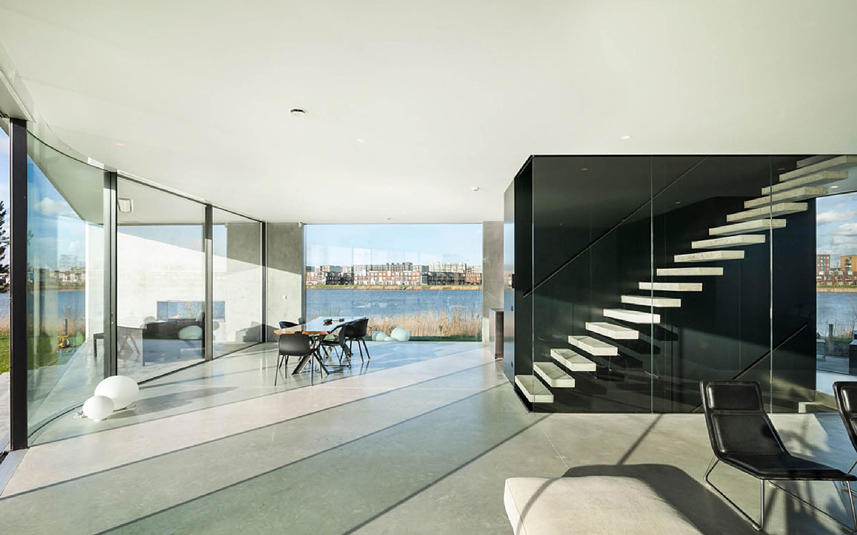 A Sleek and Bright Contemporary Home Surrounded by Water with Spectacular Views in Amsterdam by Studioninedots (4)