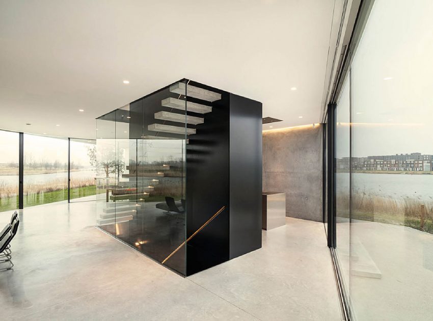 A Sleek and Bright Contemporary Home Surrounded by Water with Spectacular Views in Amsterdam by Studioninedots (5)